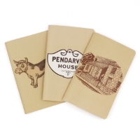 Pendarvis Notebook Bundle with three tan notebooks. Cow on front of left, then Pendarvis house logo and then image of house