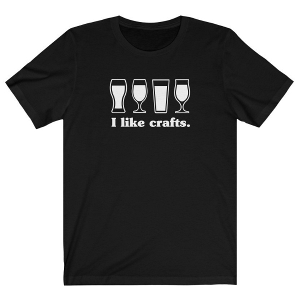 Black T-shirt with a white screen print of 4 beer glasses. Under the glasses it says "I like crafts." 