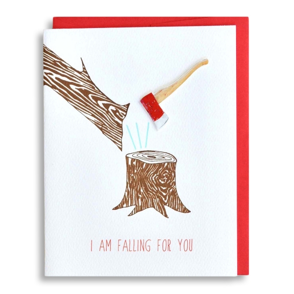 Greeting card with illustration of axe cutting a tree and words that say "Falling for you."