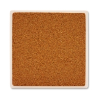 Square trivet overturned to show tan cork backing.