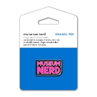 Museum Nerd pin  with pink enamel text that says "Museum Nerd." The pin is mounted on blue display card.