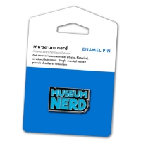 Museum Nerd pin with blue enamel text that says "Museum Nerd." The pin is mounted on blue display card.