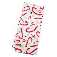 Kitchen tea towel folded into a rectangle. The towel is white with a red and green candy cane print design.