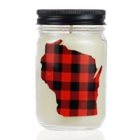 White candle contained in a clear glass jar with black tin lid. A red and black plaid cut-out shape of Wisconsin on the side of the jar. 