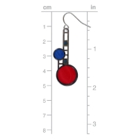 Polished brass dangle earring with asymetrical design featuring lower, larger red circle and smaller blue circle above. Shown next to ruler marking  approx 2" total length.