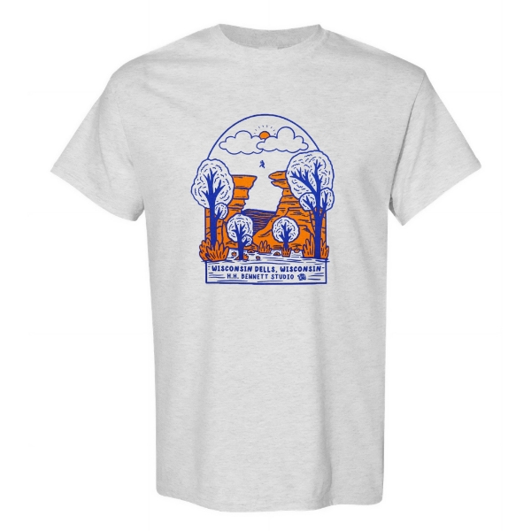  Light gray t-shirt with blue and orange illustration of a figure leaping from one tall rock formation to another.