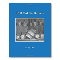 "Roll Out the Barrels," is written in yellow on a blue background above a black and white photograph of men with barrels.