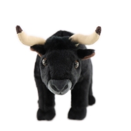 Direct head-on view of a black ox stuffed animal toy with white horns. 