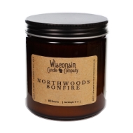 The Northwoods Bonfire 16 oz candle in brown glass container with black metal screw-on lid. 