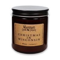 The Christmas in Wisconsin 16 oz candle in brown glass container with black metal screw-on lid.