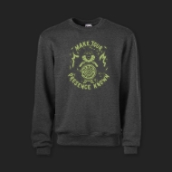 Dark gray sweatshirt with glow-in-the-dark "Halloween" design featuring a witch, candles, flames, a skull, and the words "Make Your Presence Known."