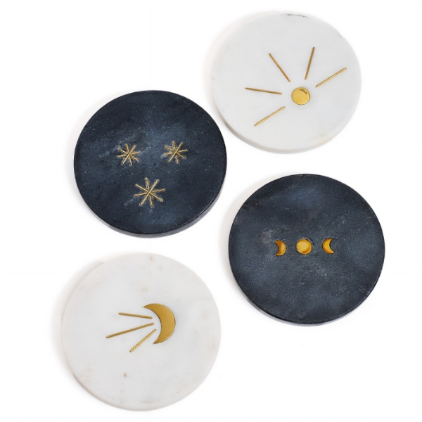 The Indukala Moon Phase Marble Coasters on a white background