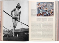 Open pages sample from "The Circus" with black and white photograph of trapeze artist on left and paragraphs of text on right with a vintage color illustration.