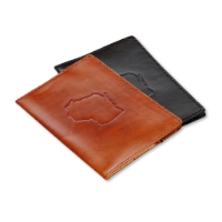 Two leather passport covers, one brown and one black.