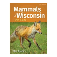 Front cover of "Mammals of Wisconsin" Field Guide with color photo of a fox.