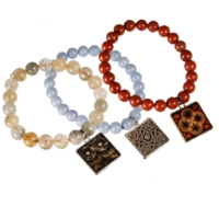 Three beaded "historic tile" bracelets with natural stone beads. 